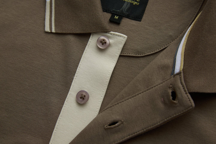 Walnut polo shirt with contrast white placket, button details, and pocket opening