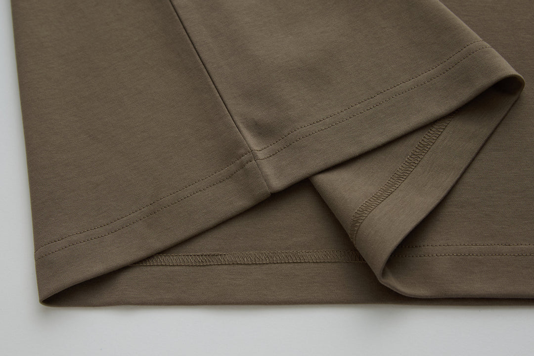 Walnut polo shirt side seam and straight hem with clean stitching