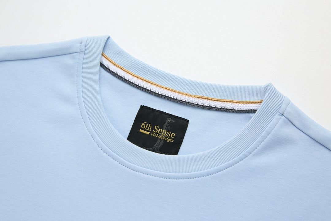 Light blue crew-neck t-shirt with interior neck taping and brand tag
