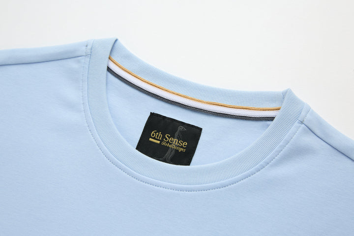 Light blue crew-neck t-shirt with interior neck taping and brand tag