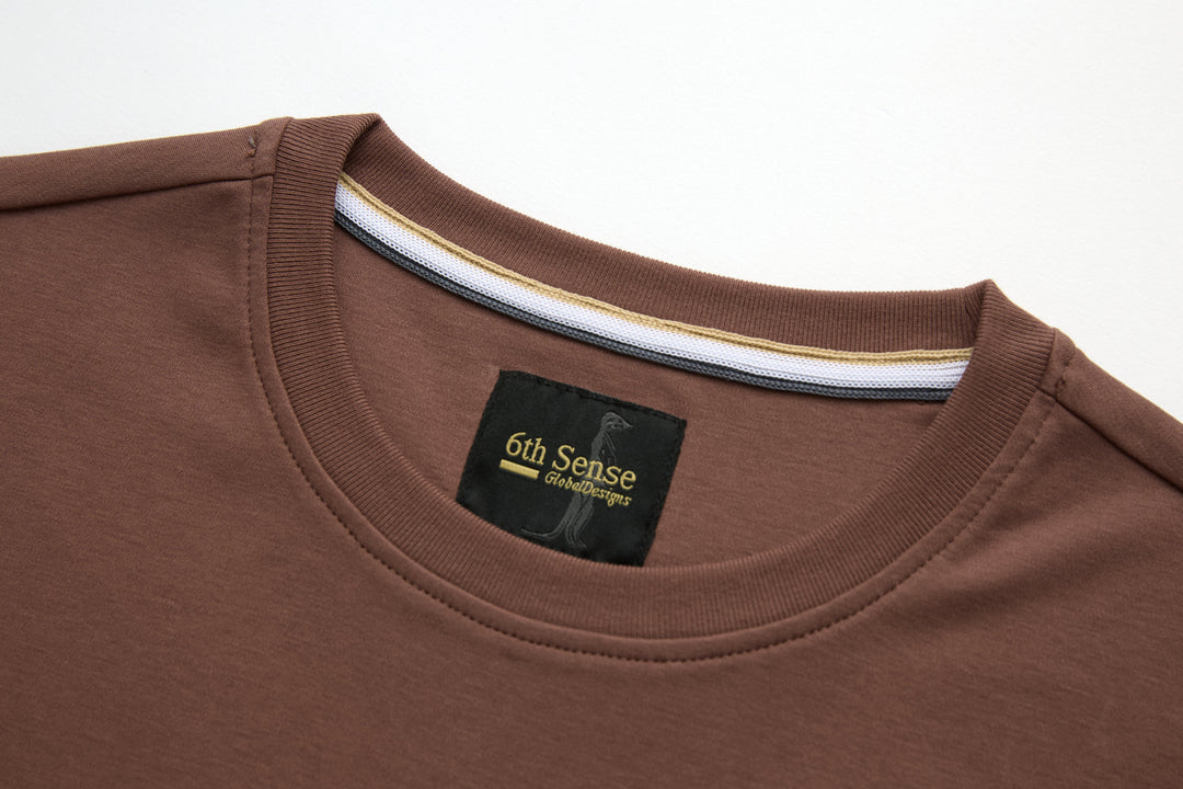 Brown crew-neck t-shirt with ribbed collar and interior brand label