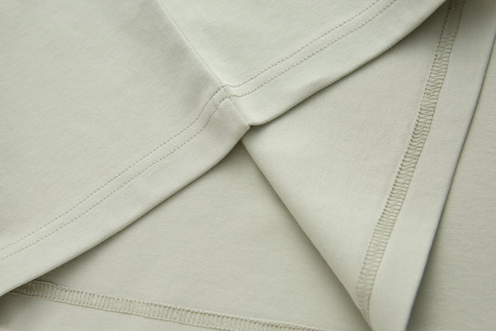 Celadon t-shirt sleeve hem with double-stitched seam detail