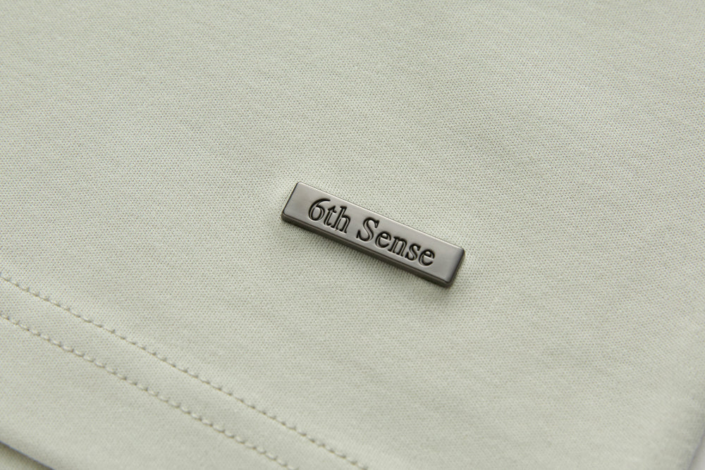 Celadon t-shirt chest logo patch with 6th Sense branding