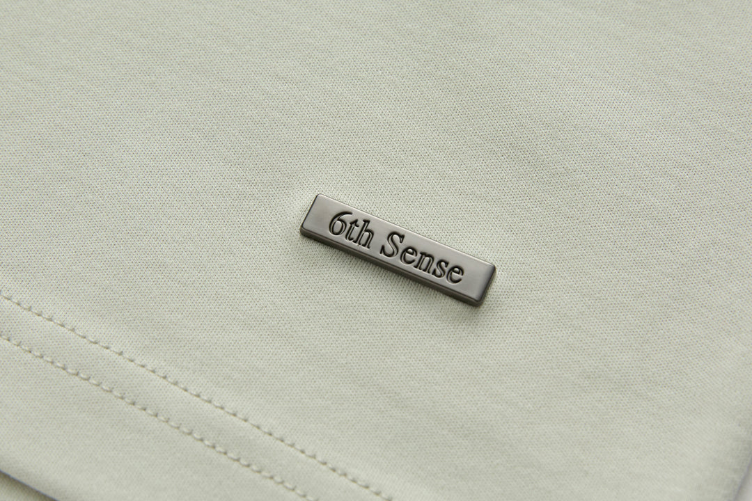 Celadon t-shirt chest logo patch with 6th Sense branding