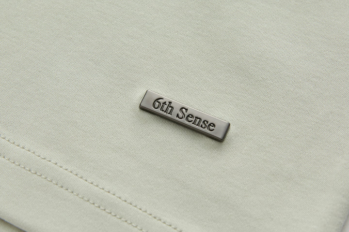Celadon t-shirt chest logo patch with 6th Sense branding