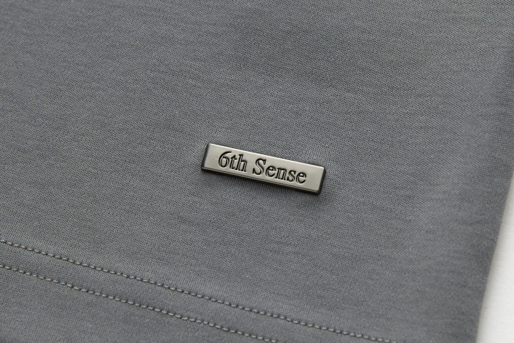 6th Sense T-shirt with small embroidered brand label at chest