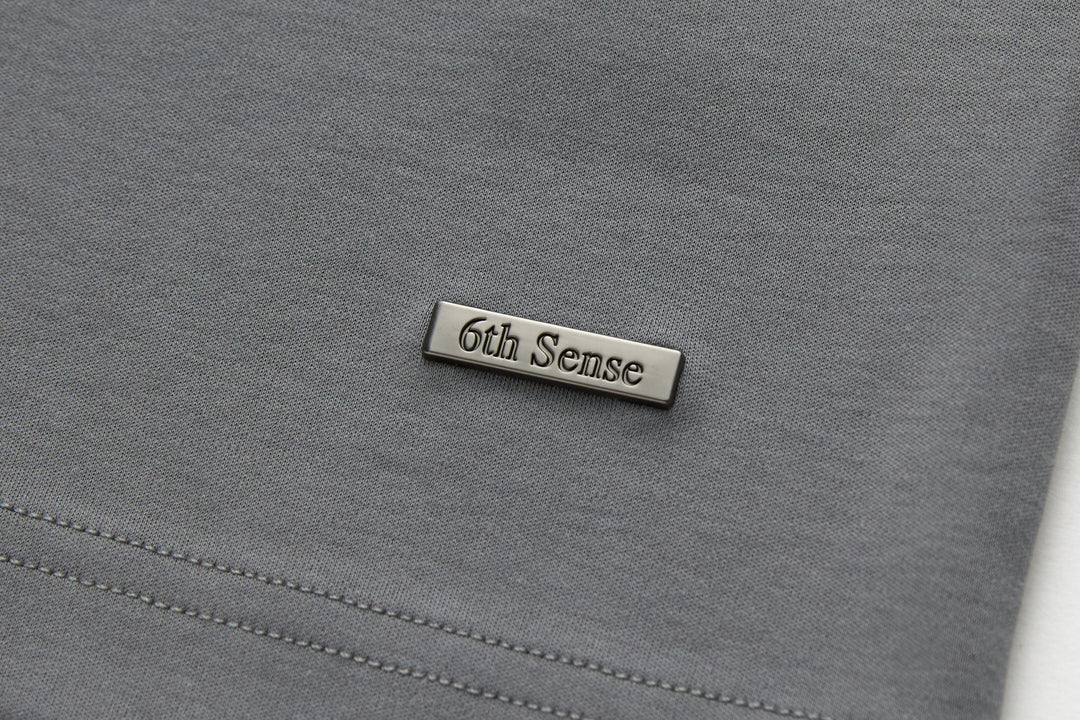 6th Sense T-shirt with small embroidered brand label at chest