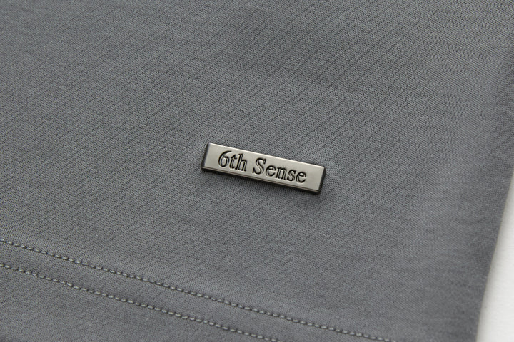 6th Sense T-shirt with small embroidered brand label at chest