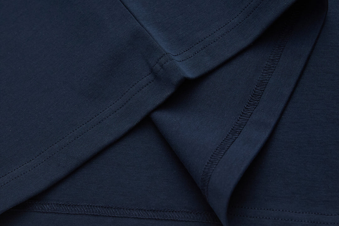 Navy 6th Sense T-shirt sleeve seam and underarm stitching close-up