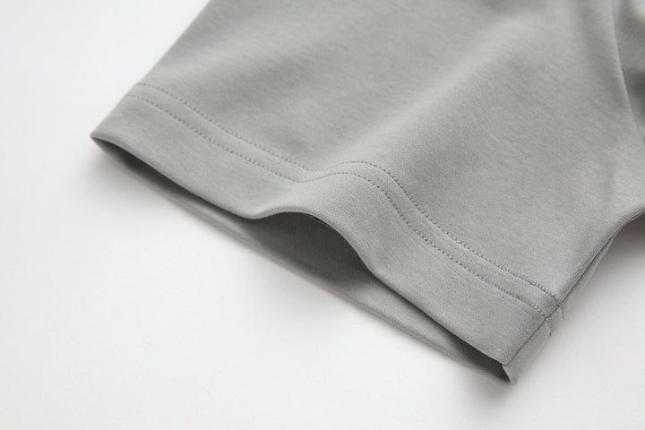 Light gray T-shirt sleeve hem with double stitching