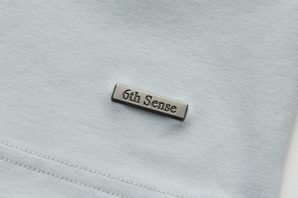 Oyster light blue T-shirt with 6th Sense neck label patch