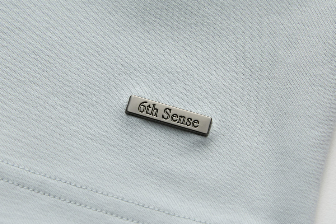 Oyster light blue T-shirt with 6th Sense neck label patch