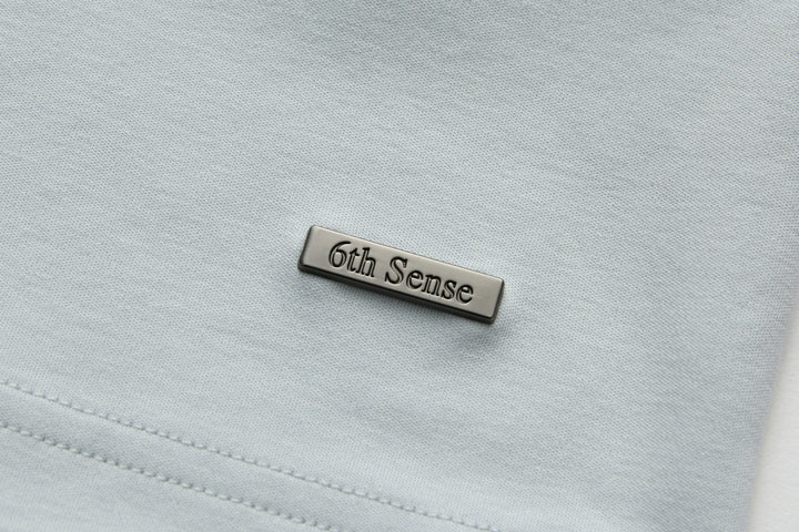 Oyster light blue T-shirt with 6th Sense neck label patch
