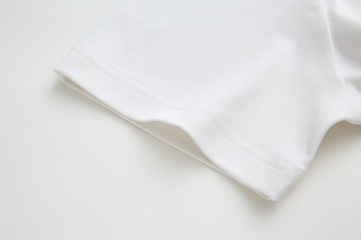 White T-shirt sleeve cuff with double-stitched hem