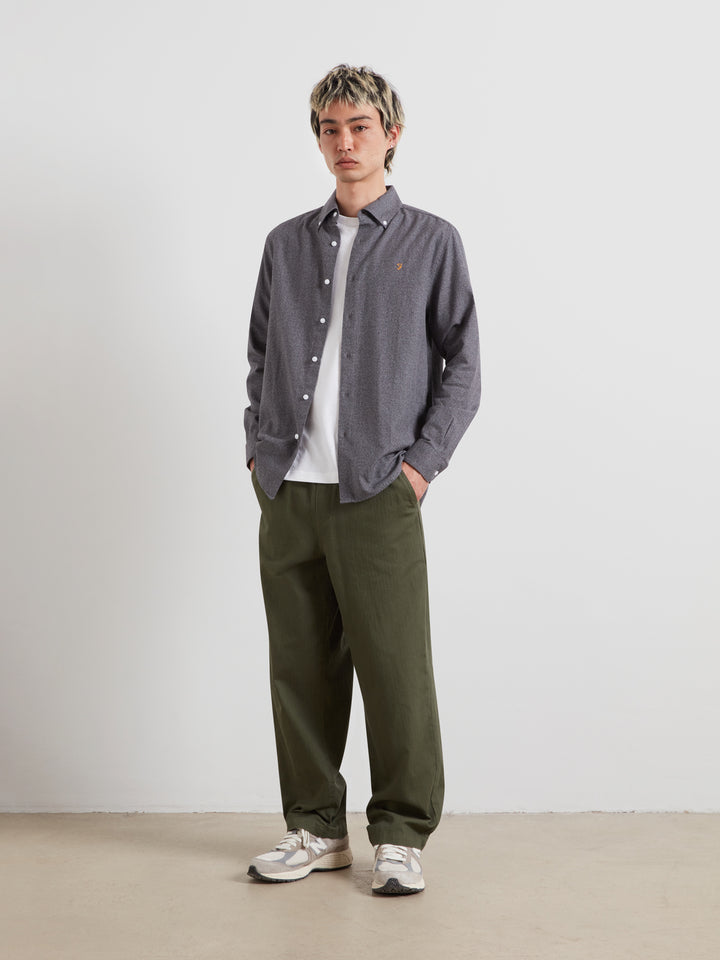 Dark blue-gray long-sleeve button-up shirt with pointed collar and full-length sleeves