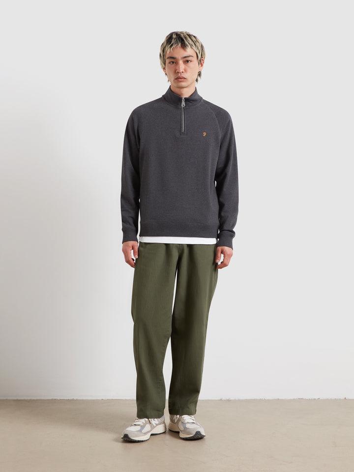 Washed black marl quarter-zip top, long sleeves, small logo on chest