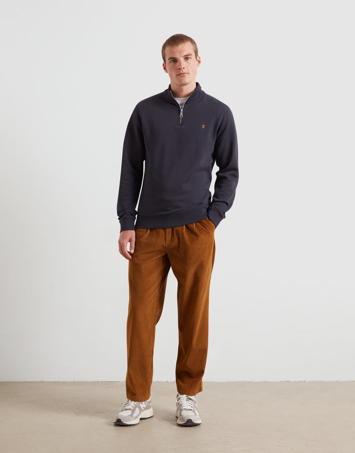 Navy 1/4-zip sweatshirt top with long sleeves and small chest logo