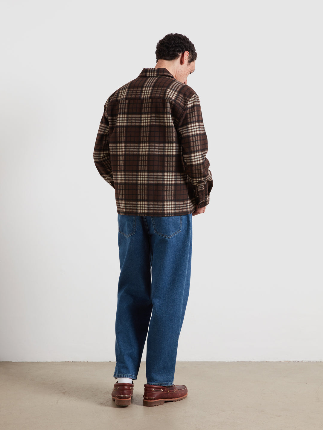 Dark brown check zip overshirt back view with long sleeves and front zipper