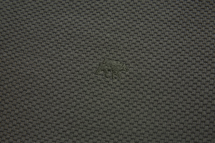 Grey 1/4-zip top fabric close-up with textured woven pattern