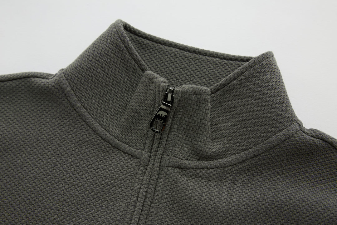 Grey 1/4-zip top neckline with stand collar and quarter-zip placket
