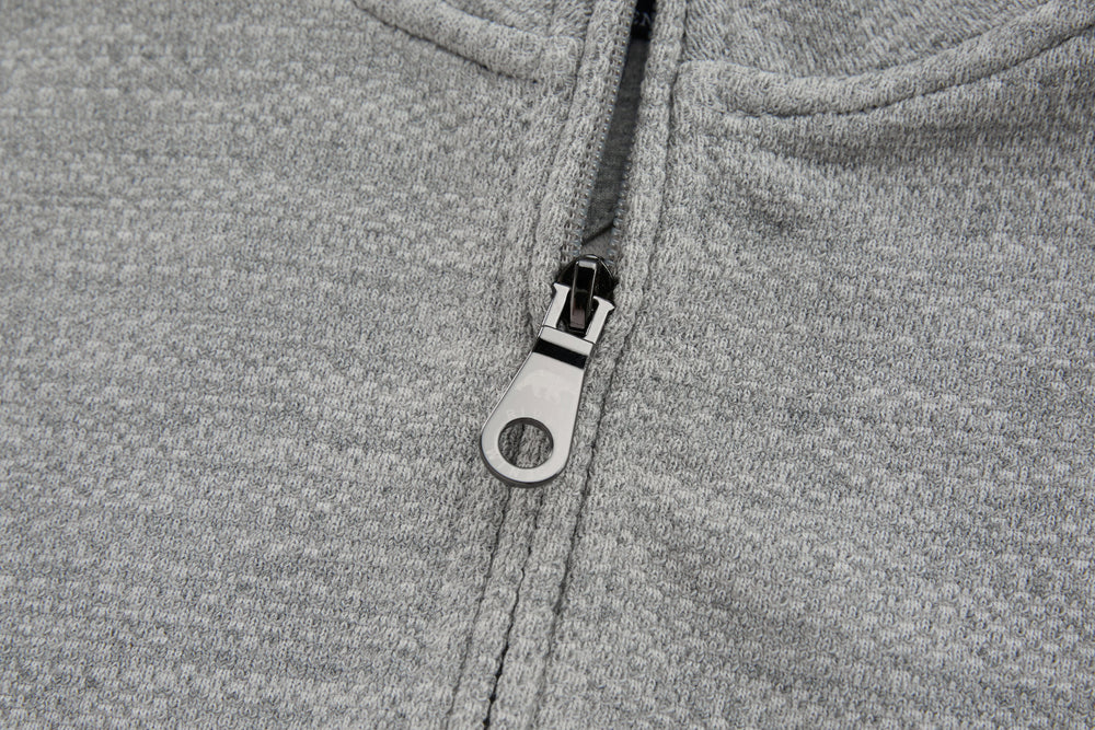 1/4-zip top zipper pull with dark pull tab and metal zipper teeth