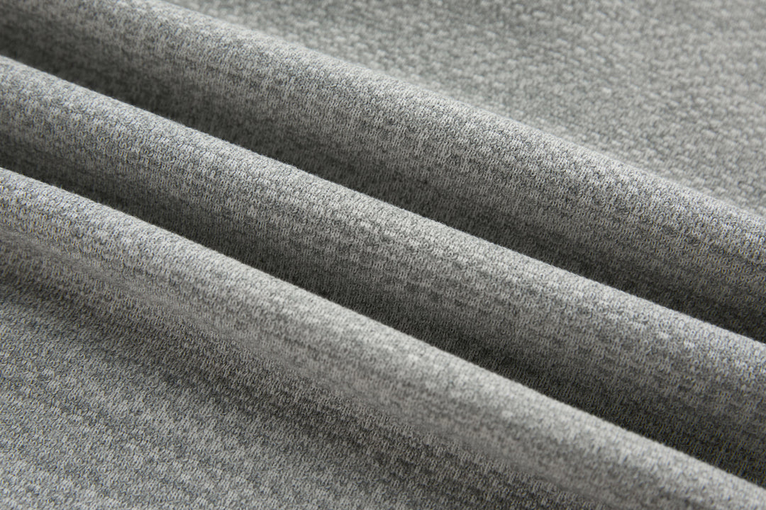 Heather gray 1/4-zip top fabric panel with layered fold texture