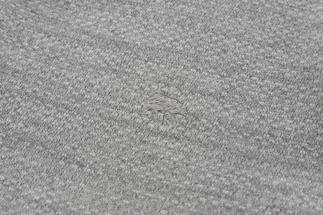 Heather gray knit 1/4-zip top fabric close-up with subtle texture
