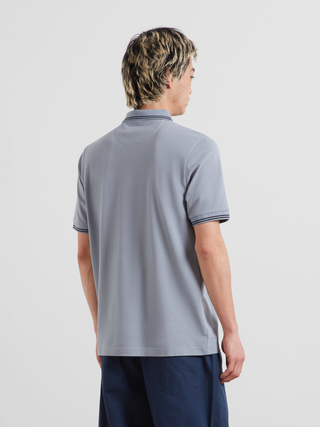Light blue tipped polo shirt back view with ribbed collar and matching sleeve trim