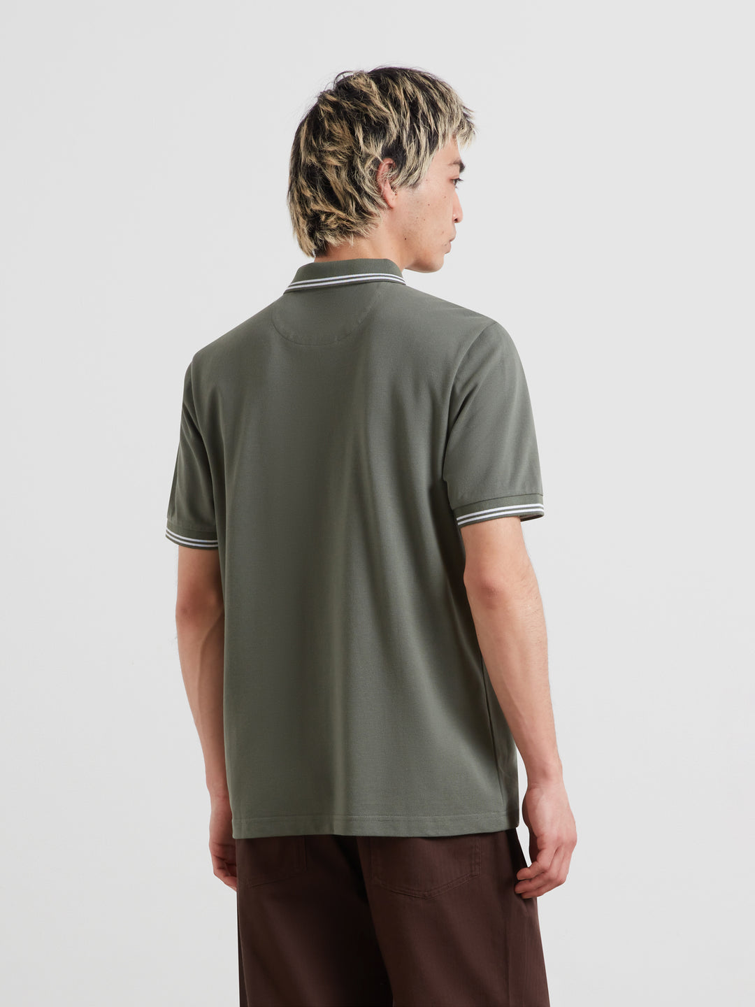 Olive green polo shirt, back view, striped collar and sleeve tipping, short sleeves