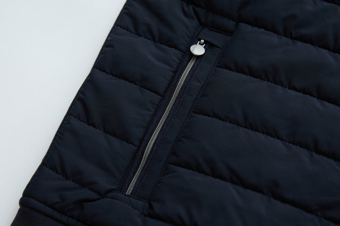 Navy hybrid jacket front with stand collar and vertical zipper
