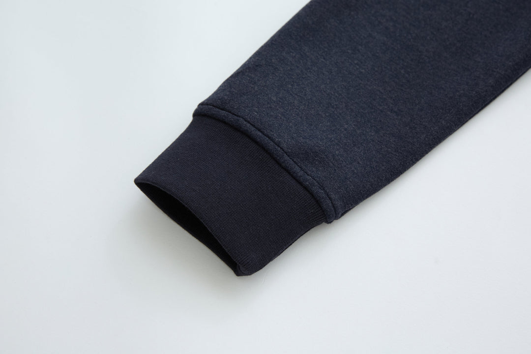 Navy jacket sleeve cuff with soft knit finish