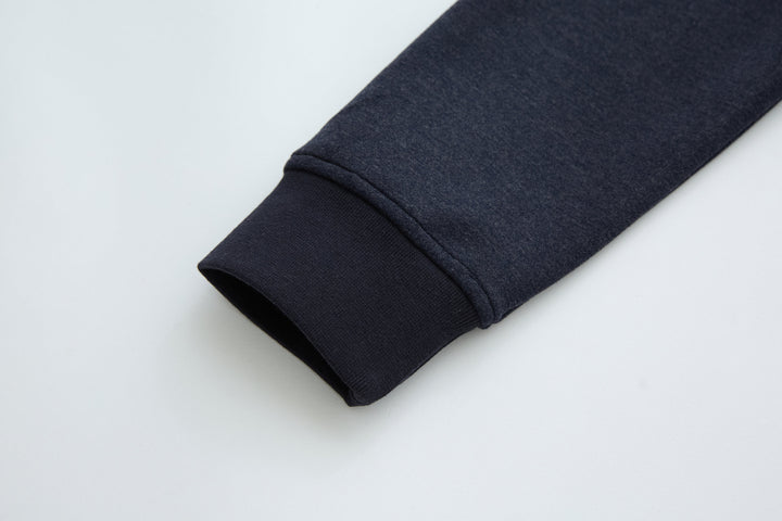 Navy jacket sleeve cuff with soft knit finish