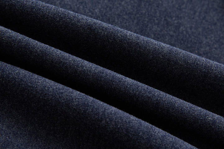 Navy hybrid jacket fabric close-up with quilted outer texture