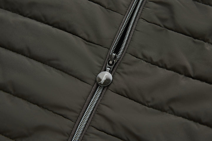 Front zipper close-up with metal pull and contrasting trim