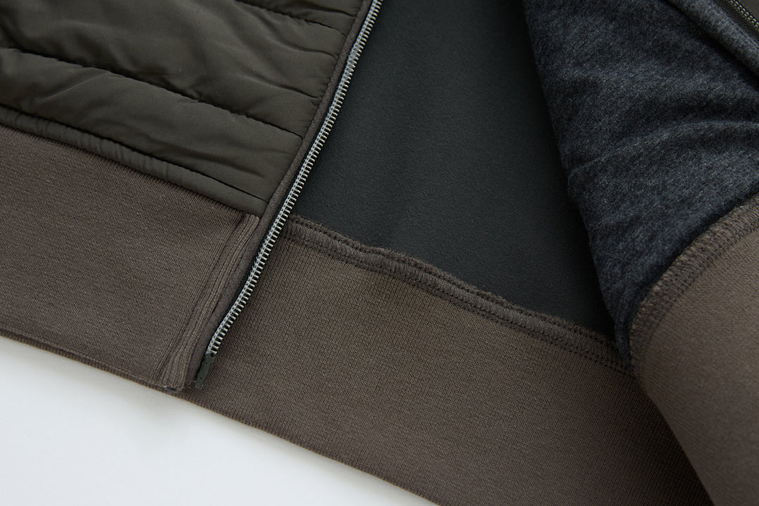 Jacket hem with rib-knit cuff and interior facing visible