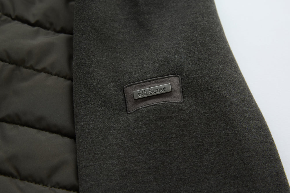 Hybrid jacket with dark knit panel and 6th Sense logo patch detail