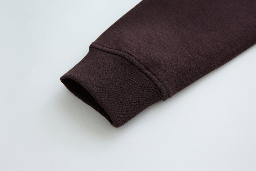 Plum jacket sleeve cuff with ribbed hem