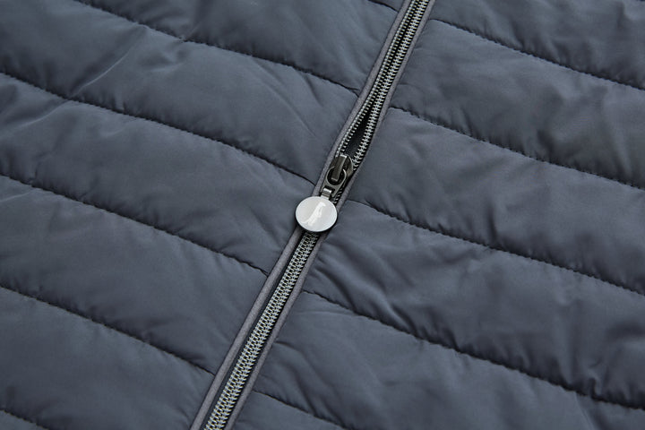 Hybrid jacket front zipper detail on dark quilted shell