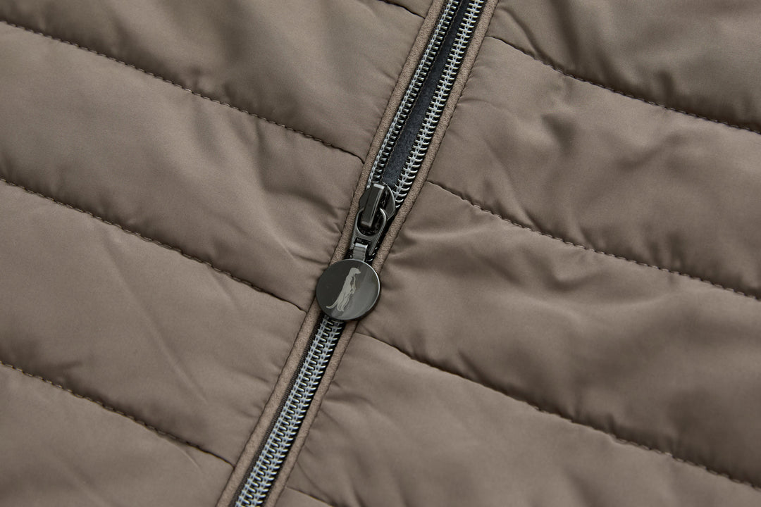 Taupe hybrid jacket front zipper with round pull tab and quilted yoke
