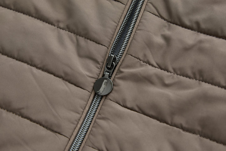 Taupe hybrid jacket front zipper with round pull tab and quilted yoke