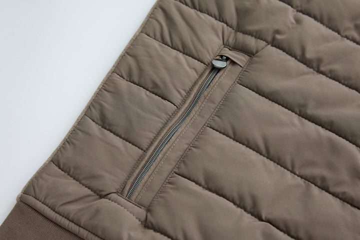 Taupe quilted hybrid jacket with front zipper and stand collar