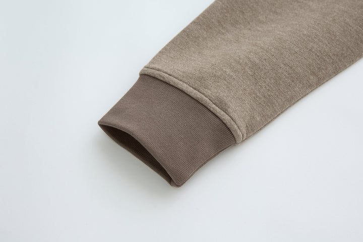 Taupe hybrid jacket ribbed sleeve cuff with folded edge