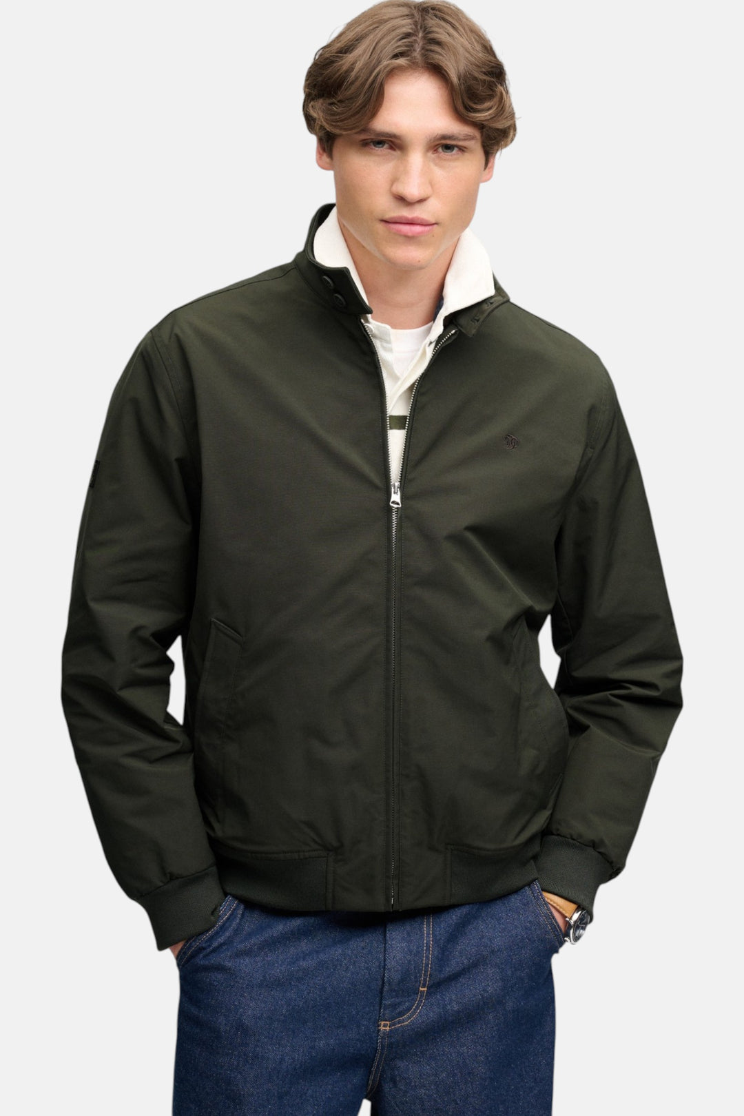 Olive green padded Harrington jacket with front zip, stand collar, and elastic cuffs