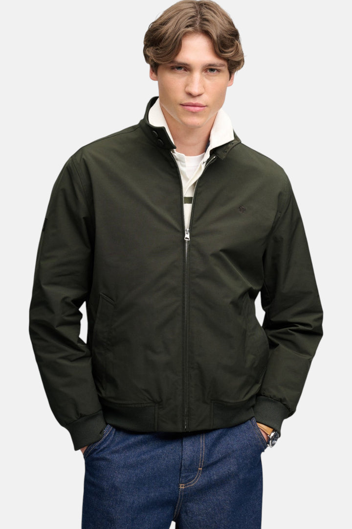 Olive green padded Harrington jacket with front zip, stand collar, and elastic cuffs