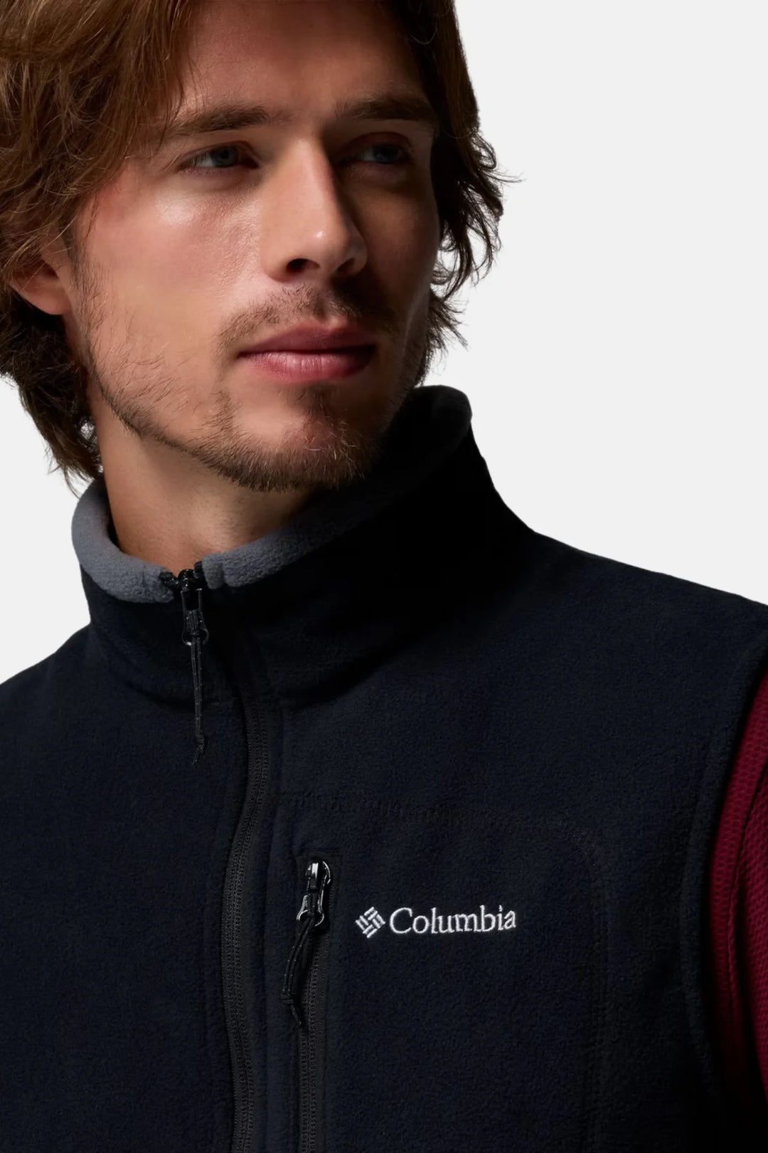 Black fleece vest with stand collar, zipper front, and Columbia logo on chest