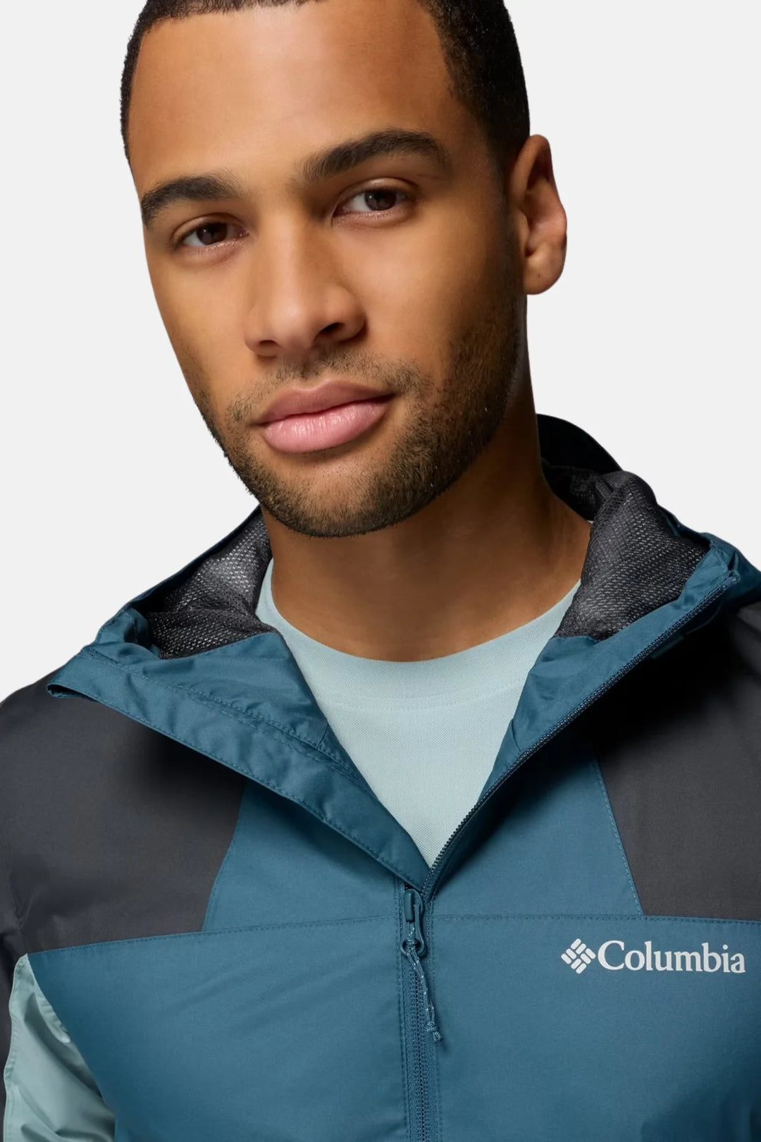Men's waterproof jacket, teal blue with dark collar and Columbia logo at chest