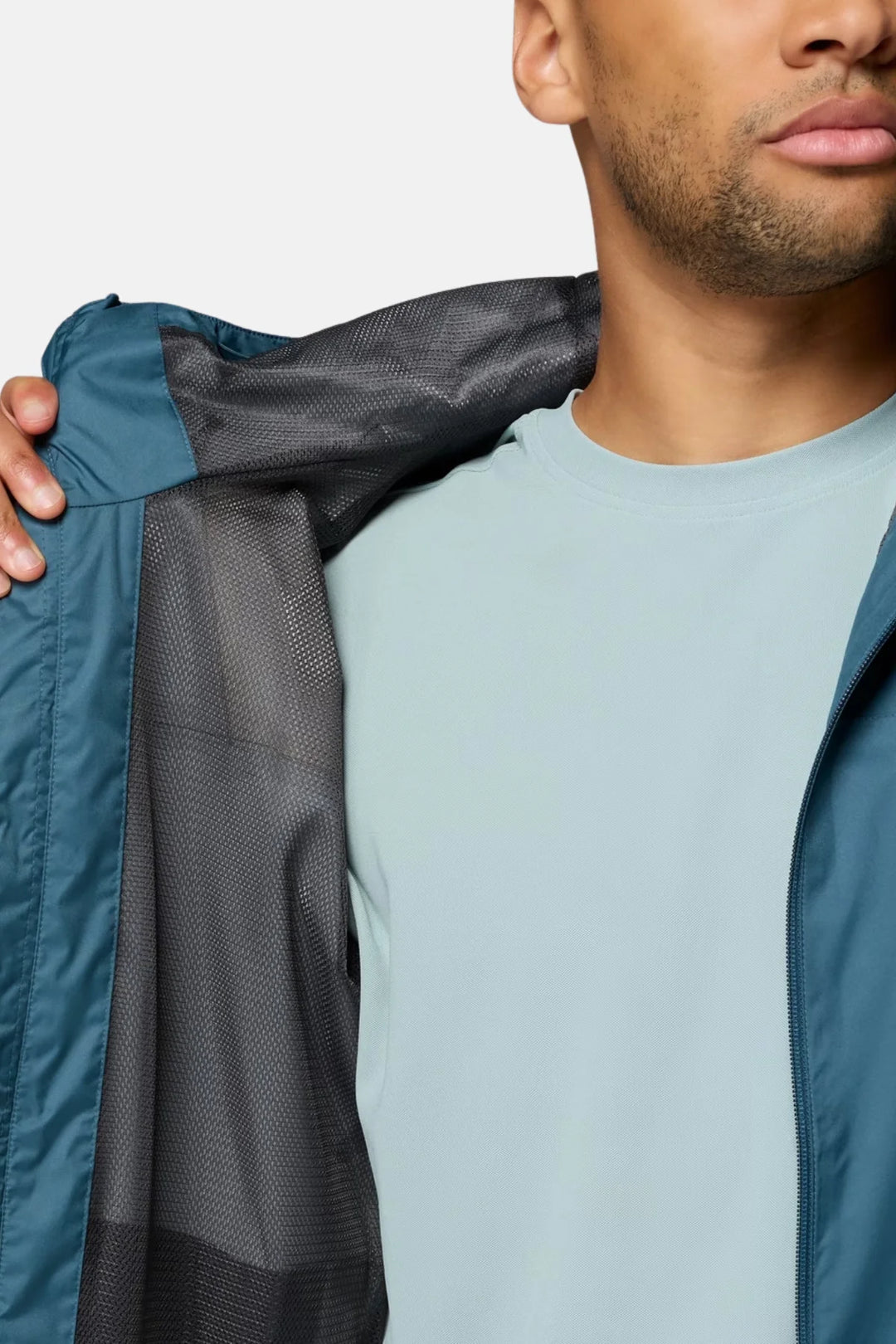 Men's waterproof jacket showing mesh-lined interior pocket opening