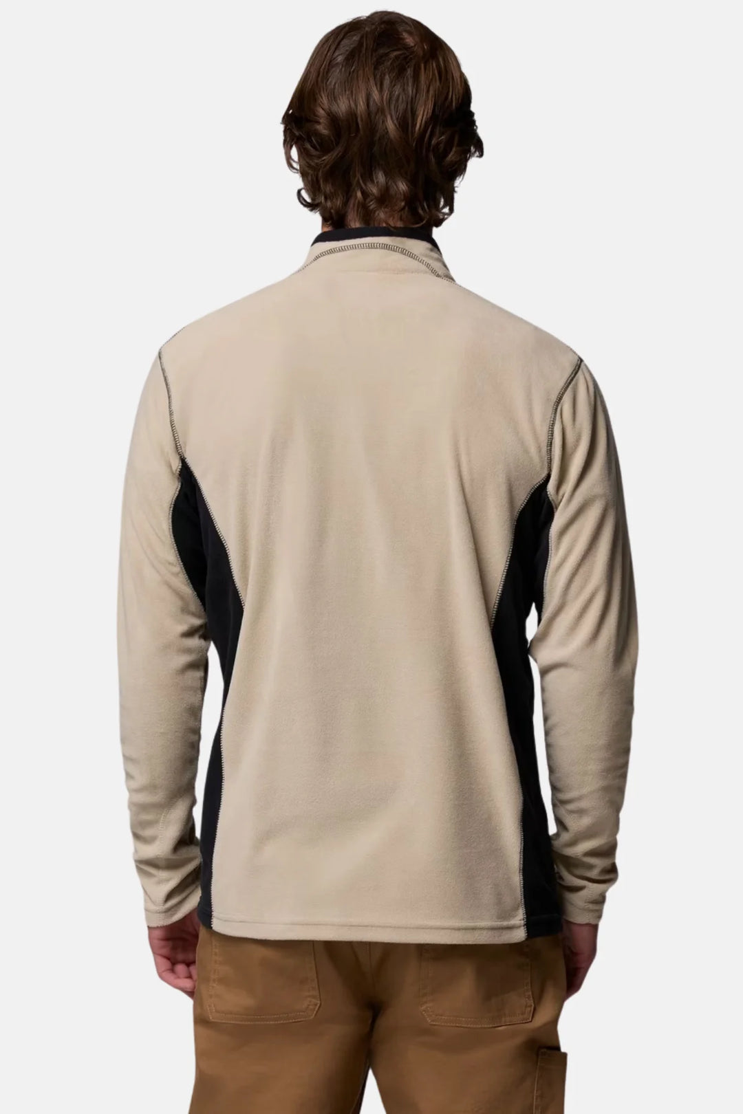 Back view of half-zip fleece top, beige with dark side panels