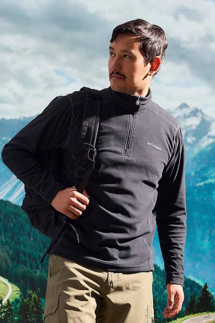Black Columbia half-zip fleece top with zip placket and long sleeves