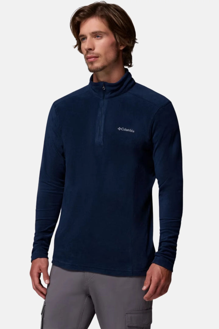 Navy half-zip fleece top with mock-neck collar and chest logo